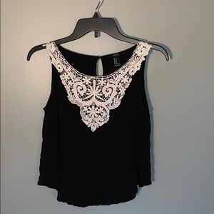 Black blouse with cream white crochet design